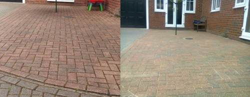 driveway before & after its cleaned